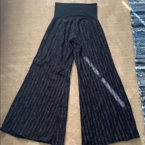 Flared out “Bell bottom” black and gold pants